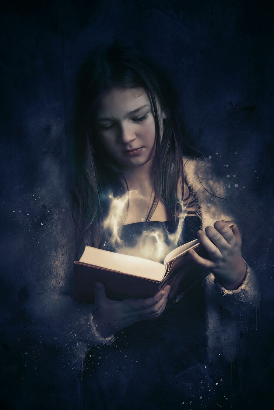 Pige læser fantasy bog